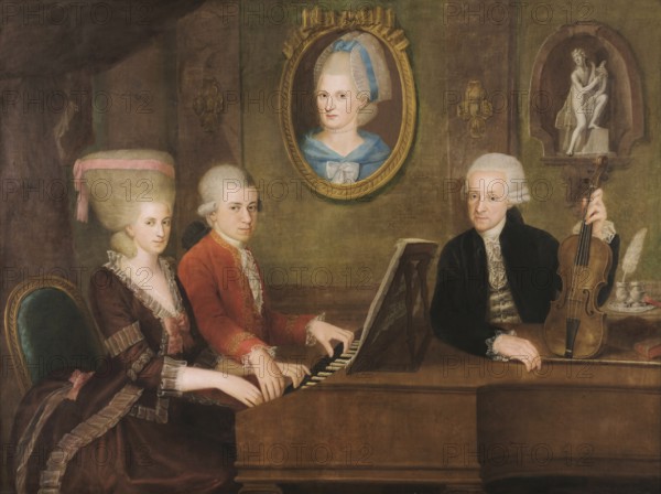 Wolfgang Amadeus Mozart with his sister Maria Anna Nannerl and father Leopold, on the wall a portrait of his dead mother Anna Maria, c. 1780, digitally edited after a painting by Croce