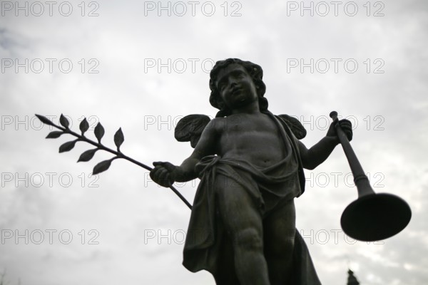 Statue, Angel of Peace lowers war trumpet, Leoben, Styria, Austria, Europe