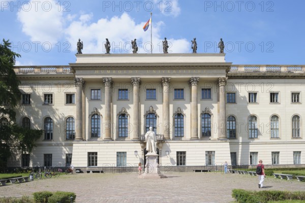 Berlin, Germany, July 20, 2024, historic main building of Humboldt University with Helmholtz monument in the entrance area, Europe