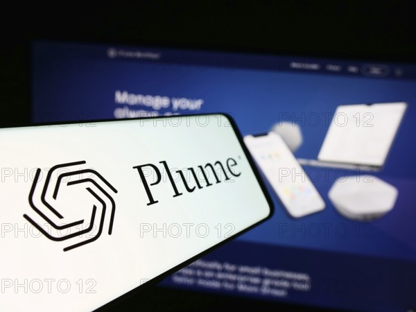 Stuttgart, Germany, 07-11-2024: Cellphone with logo of American company Plume Design Inc. in front of business website. Focus on center-left of phone display, Europe