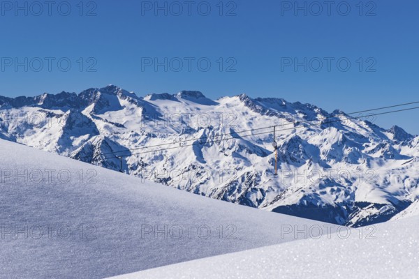 Snow-covered mountains under a clear blue sky, creating a serene winter landscape, Aneto Peak, snow, Pyrenees, Spain, Europe