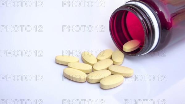 Open Medicine Bottle with Scattered Pills, Pharmaceutical Healthcare Background, Close-up, Medical Concept
