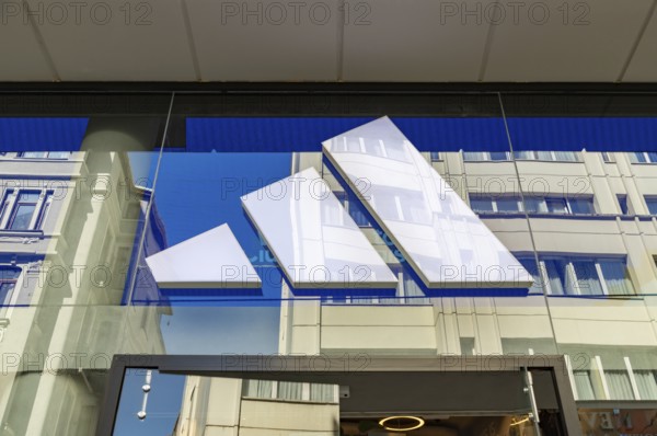 A picture of the facade of an Adidas store