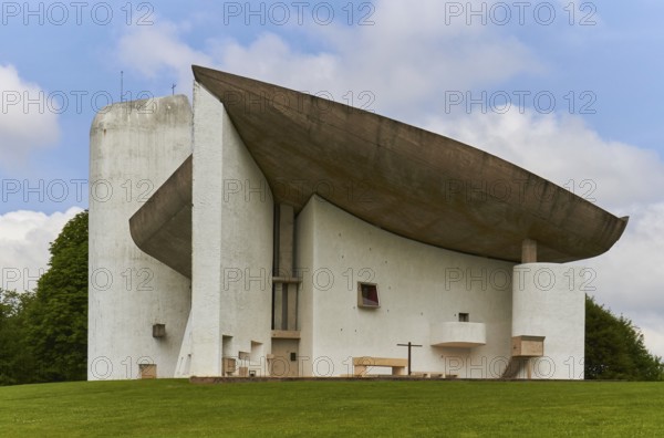 Modern church by Le Corbusier with striking concrete roof construction. Notre Dame du Haut chapel in Ronchamp, a UNESCO World Heritage Site in the Haute-Saône department of Franche-Comté. France