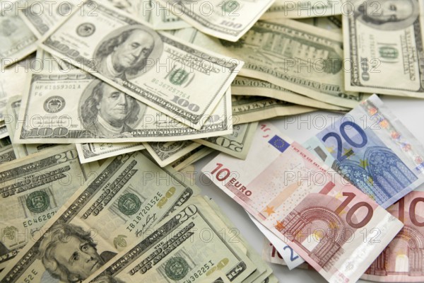 Dolar versus euro notes, finance metaphor image