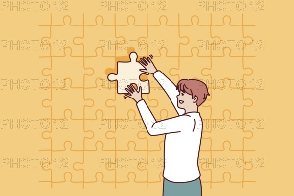 Business man putting last piece of puzzle in free space for problem solving concept. Guy in business clothes is engaged in obtaining new skills and performs complex challenge on instructions manager