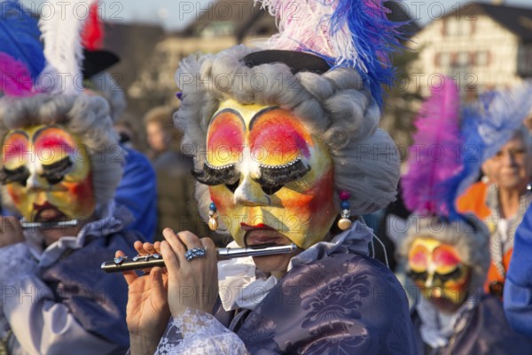 Basel, Switzerland, March 10, 2014: The tradtional carnival parade with dressed up people, Europe