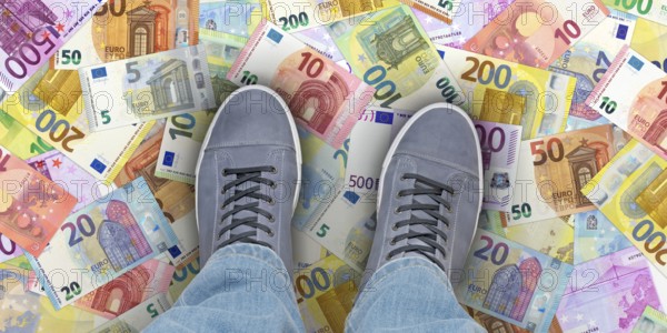 The money is on the street A person stands on euro banknotes