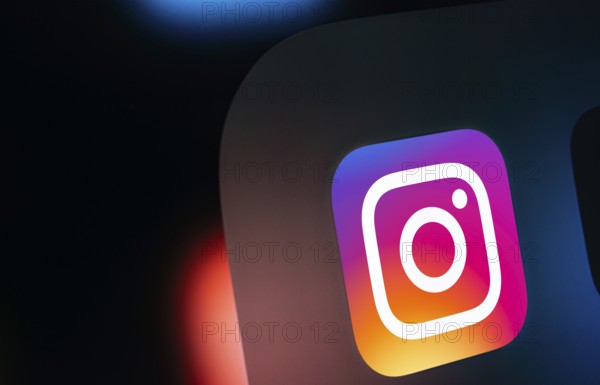 A close up of an iPad screen displaying the instagram app icon