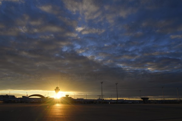Control tower, MAC (Munich Airport Centre) Terminal 1, apron west and Vietnam Airlines Boeing B787 Dreamliner at sunrise, Munich Airport, Upper Bavaria, Bavaria, Germany, Europe