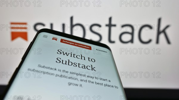 Stuttgart, Germany, 12-19-2022: Mobile phone with webpage of US subscription company Substack Inc. on screen in front of business logo. Focus on top-left of phone display, Europe