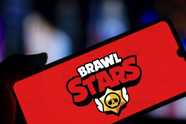 brawl stars logo is displayed on smartphone. Brawl Stars is a multiplayer online battle arena video game company