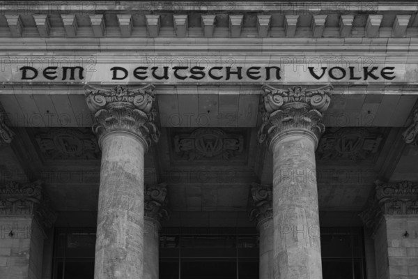 Reichstag building with the inscription Dem Deutschen Volke, black and white, Berlin, Germany, Europe