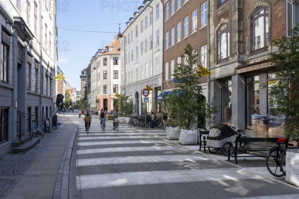 Copenhagen, Denmark, September 03, 2021: People and shops on Skindergade in the historic city centre, Europe