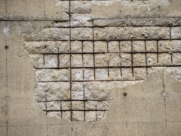 Old wall background with concrete and rusty metal