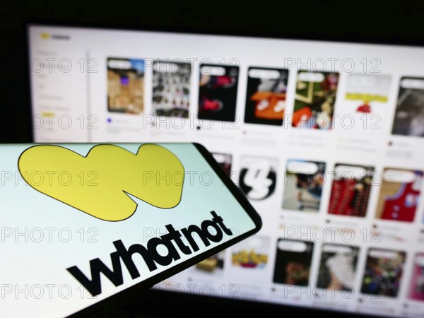 Stuttgart, Germany, 07-23-2022: Mobile phone with logo of US e-commerce company Whatnot Inc. on screen in front of business website. Focus on center-right of phone display, Europe