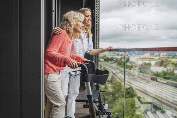 Young blonde woman caregiver helping senior woman at home. Nurse assisting her old woman patient at nursing home. Senior woman being helped by nurse at home.