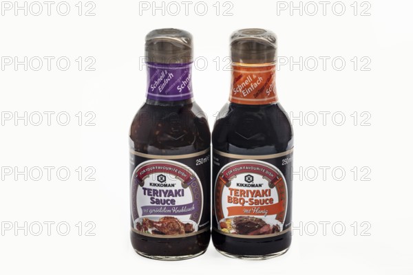 WETZLAR, Germany - 2022-07-17: Two Bottles of Kikkoman Teriyaki Sauce. In 1917 the Japanese Mogi and Takanashi families founded Noda Shoyu Co. Ltd. The company name was changed to Kikkoman Shoyu Co. in 1964 and to Kikkoman Corporation in 1980