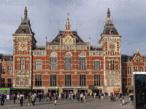 Impressive façade with two towers Neo-Renaissance building of Amsterdam Central Station, Amsterdam, North Holland, Netherlands