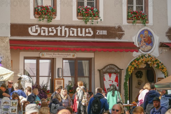 Old inn with many people in the old town, Berchtesgaden, Berchtesgadener Land, Upper Bavaria, Bavaria, Germany, Europe