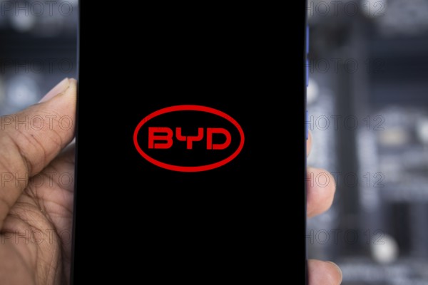 Mobile phone with business logo of Chinese car manufacturer BYD Co. Ltd