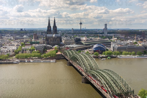 COLOGNE, GERMANY - MAY 12: Cityscape of Cologne, Germany on May 12, 2019. View from Triangle tower to the cathedral and Hohenzolern Bridge