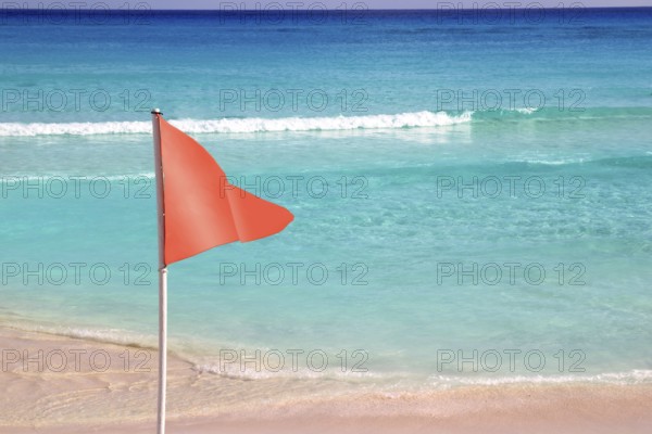 Dangerous red flag in tropical beach for avoid bathing