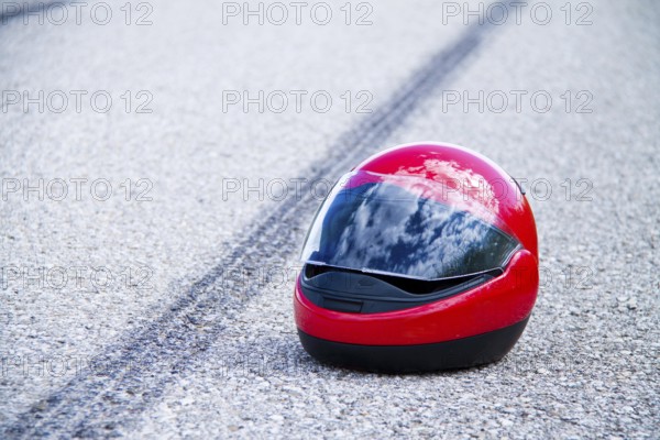 An accident with a motorbike. Traffic accident and skid marks on road Symbol photo, An accident with a motorbike. Traffic accident and skid marks on road. Representative photo. Austria
