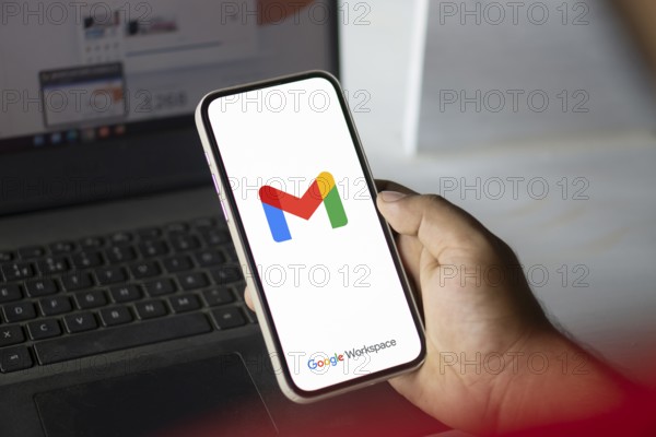 Google Gmail logo is displayed on smartphone