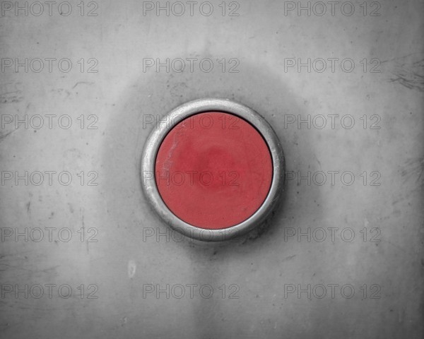 A Retro Filtered Image Of A Blank Red Industrial Button