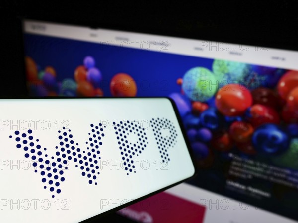 Stuttgart, Germany, 03-01-2022: Smartphone with logo of British advertising company WPP plc on screen in front of business website. Focus on center-left of phone display, Europe