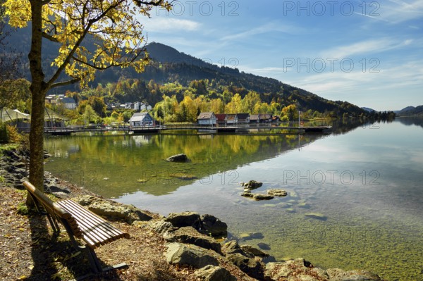 Lakeside path and boathouses on the autumnal large Alpsee lake near Bühl, Immenstadt Im Allgäu, Upper Allgäu, Bavaria, Germany, Europe