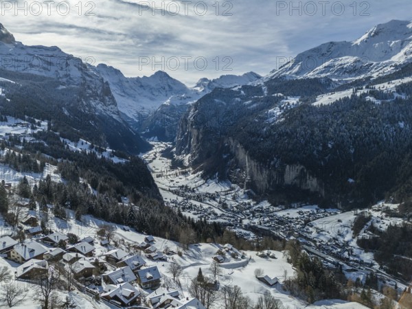 Lauterbrunnen Valley and Snowy Mountains on Sunny Winter Day. Swiss Alps. Switzerland. Aerial View. View from Wengen
