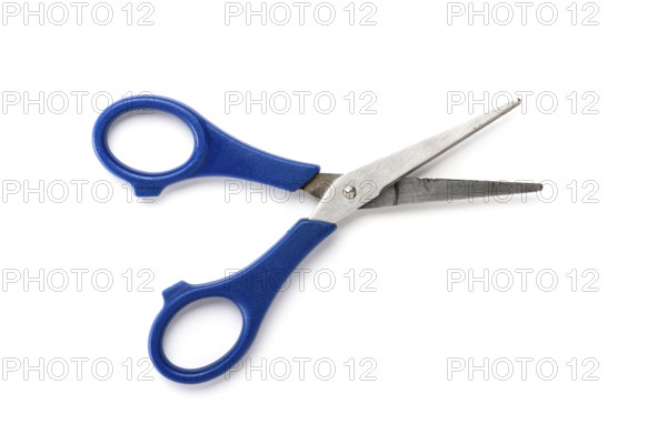 Old used children scissors, isolated on white