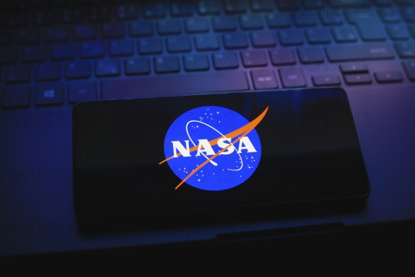 In this photo illustration, the National Aeronautics and Space Administration (Nasa) logo is displayed on a smartphone screen