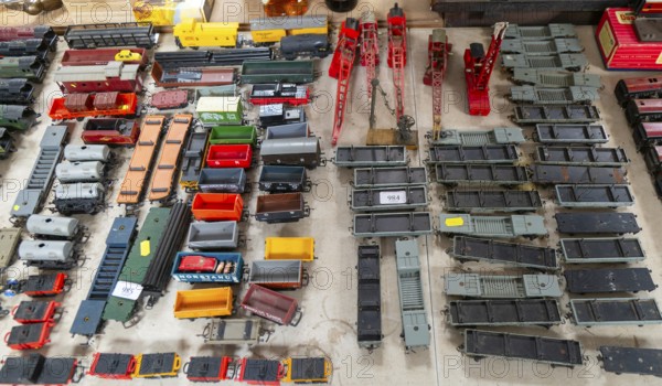 Model railway toy train set items on display for sale at auction room, UK