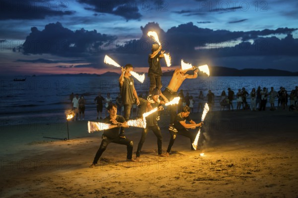 Fire show, jugglers with fire, Ao Nang Beach, sunset, Ao Nang, Krabi, Thailand, Asia