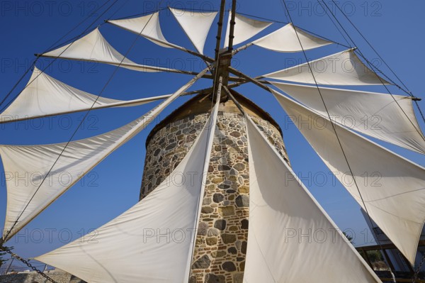 Wide sails on a stone windmill, blue sky in the background, windmill, Antimacheia, Kos, Dodecanese, Greek Islands, Greece, Europe