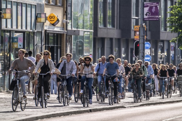 Central cycle path on the Lange Viestraat, lanes for pedestrians, cyclists and local traffic are separated in the city centre, dense traffic, no car/truck traffic, Utrecht, Netherlands