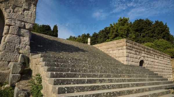 Stone staircase next to old walls, surrounded by nature and trees, open staircase to the second terrace, Asklipion, Asklepieion, healing temple, temple, Hippocrates, Kos, Dodecanese, Greek Islands, Greece, Europe