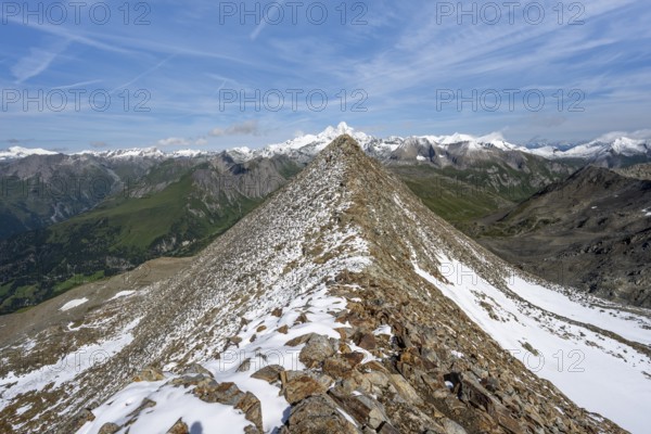 Summit Böses Weibl, view of mountain landscape with snow-covered summit of the Großglockner, Wiener Höhenweg, Schober group, Hohe Tauern National Park, Carinthia, Austria, Europe