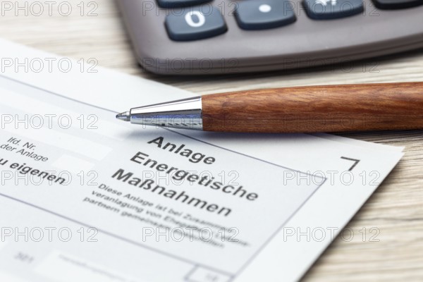 Close-up of tax return, energy measures attachment