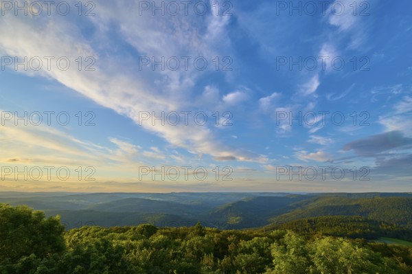 Expansive sky and green landscape during a sunset, Katzenbuckel, Waldbrunn, Neckar-Odenwald-Kreis, Odenwald, Baden-Württemberg, Germany, Europe