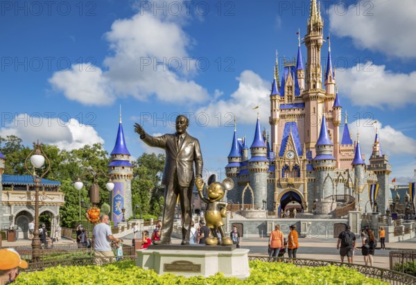 Partners statue in front of Cinderella's Castle at the end of Main Street in the Magic Kingdom at Walt Disney World, Orlando, Florida