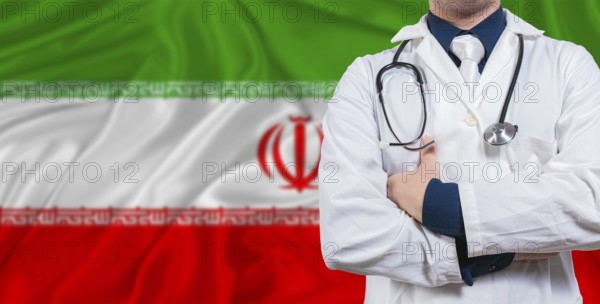 Male doctor with stethoscope on Iran flag. Doctor holding stethoscope on Iran flag