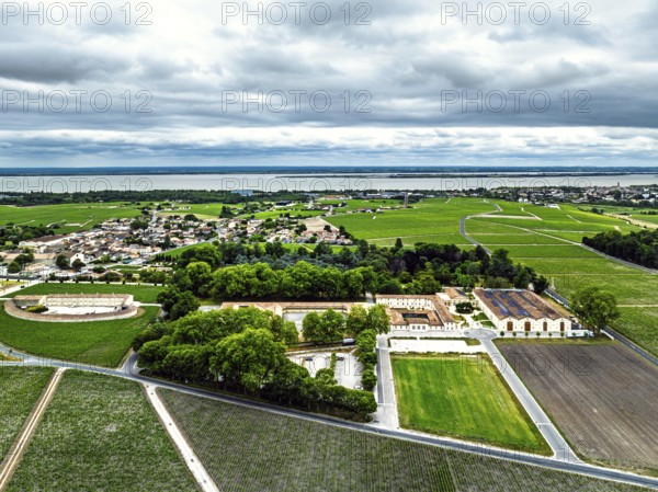 Chateau d'Armailhac Vineyard and grape fields around Pauillac and Gironde Estuary from a drone, Bordeaux, Gironde, Nouvelle-Aquitaine, France, Europe