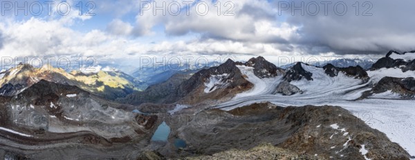 Panorama from the summit of the Becher, high mountain landscape, view of mountain peaks Königshofspitz and Schwarzwandspitz with glacier of the Übeltalferner, view of the Ridnaun valley, Stubai Alps, South Tyrol, Italy, Europe