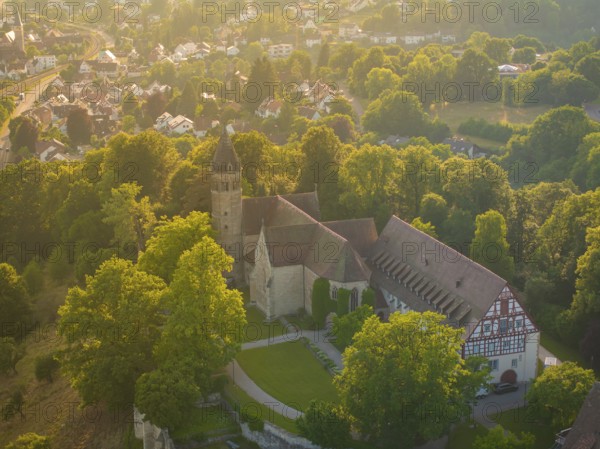 Aerial view of a village with a church complex and dense tree population, event and wedding location Lorch Monastery, Lorch, Germany, Europe