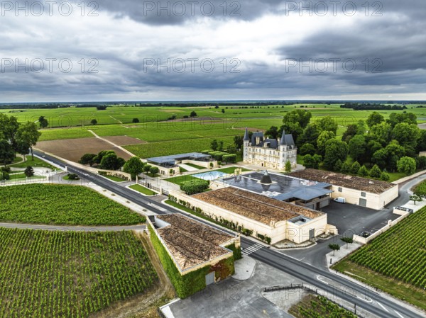 Chateau Pichon Longueville Baron Vineyard and grape fields around Pauillac from a drone, Bordeaux, Gironde, Nouvelle-Aquitaine, France, Europe