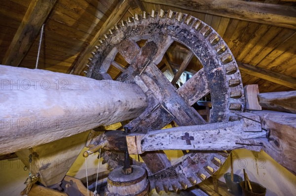 Close-up of a wooden mill wheel in a rustic interior, Kefalos, Kos, Dodecanese, Greek Islands, Greece, Europe